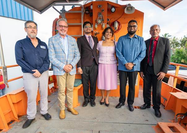Left to right: OMS Guyana GM Kenny Vorster, OMS Subsea CEO Mike Arnold, Mr. Arav Tulsi, Mrs. Naseem Tulsi, His Excellency Dr. Mohamed Irfaan Ali, and OMS Group Owner Mr. Harrychand Tulsi.